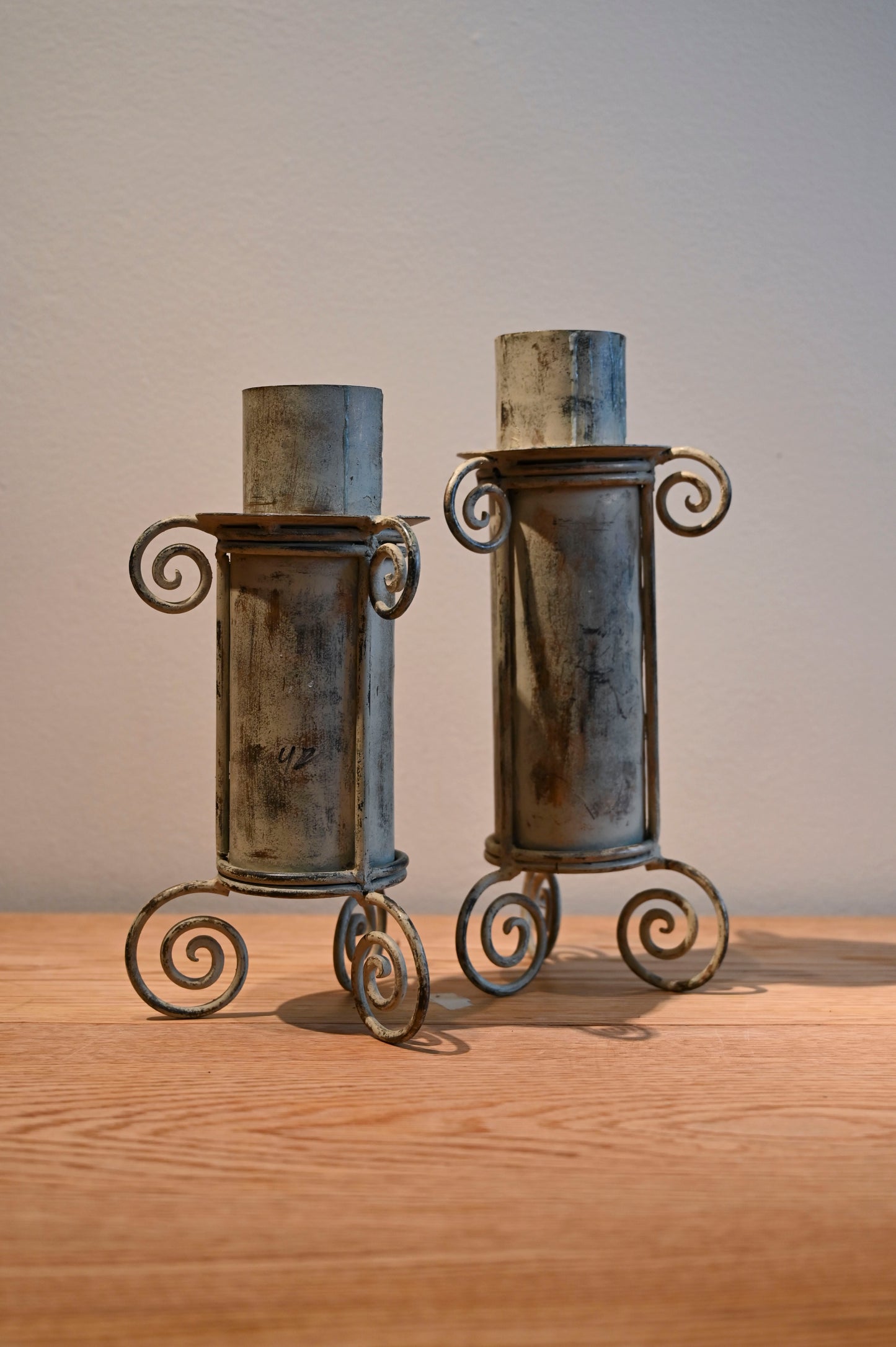 Metal pillar candle holders