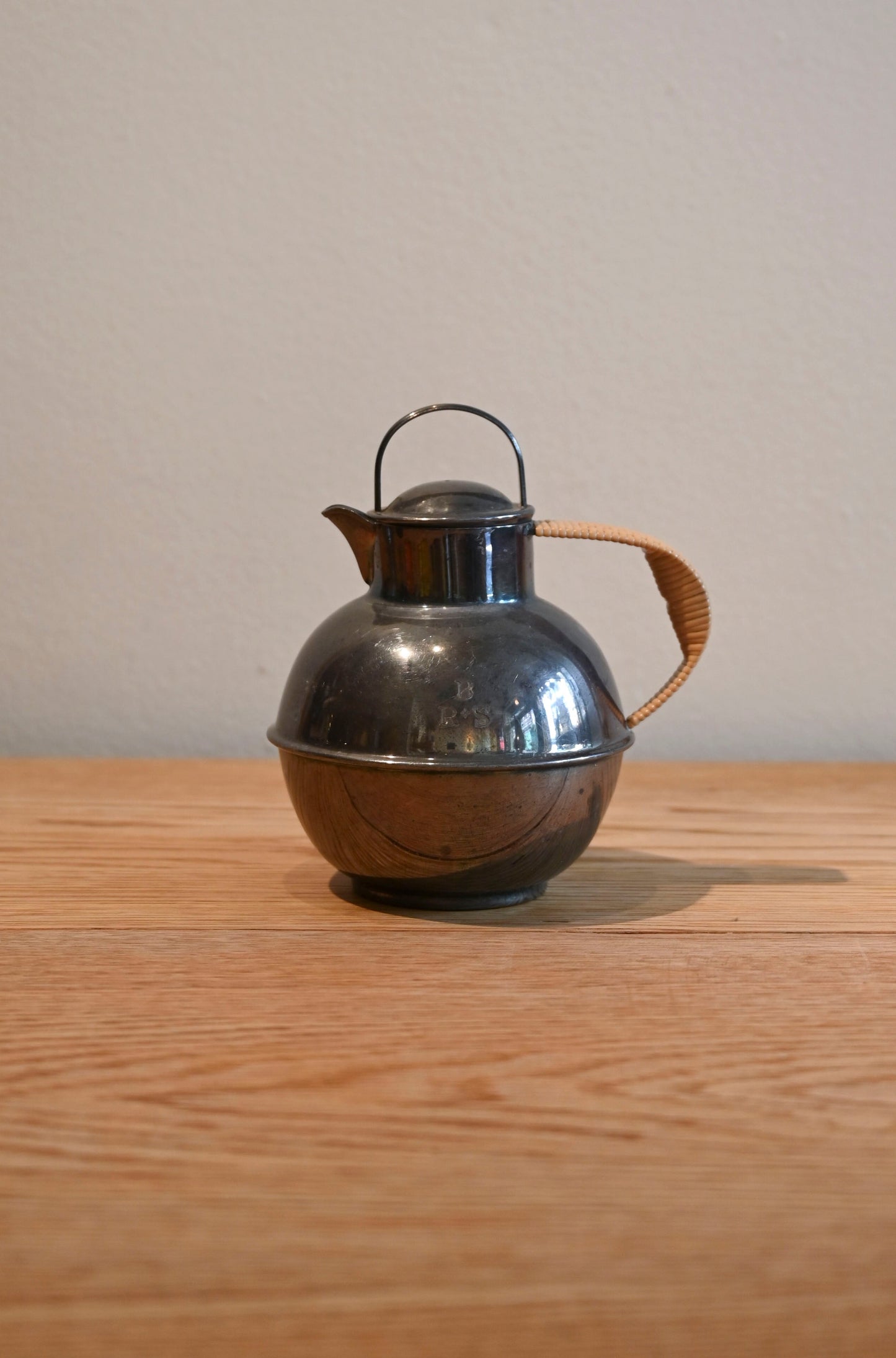 Vintage silver plated teapot with woven handle