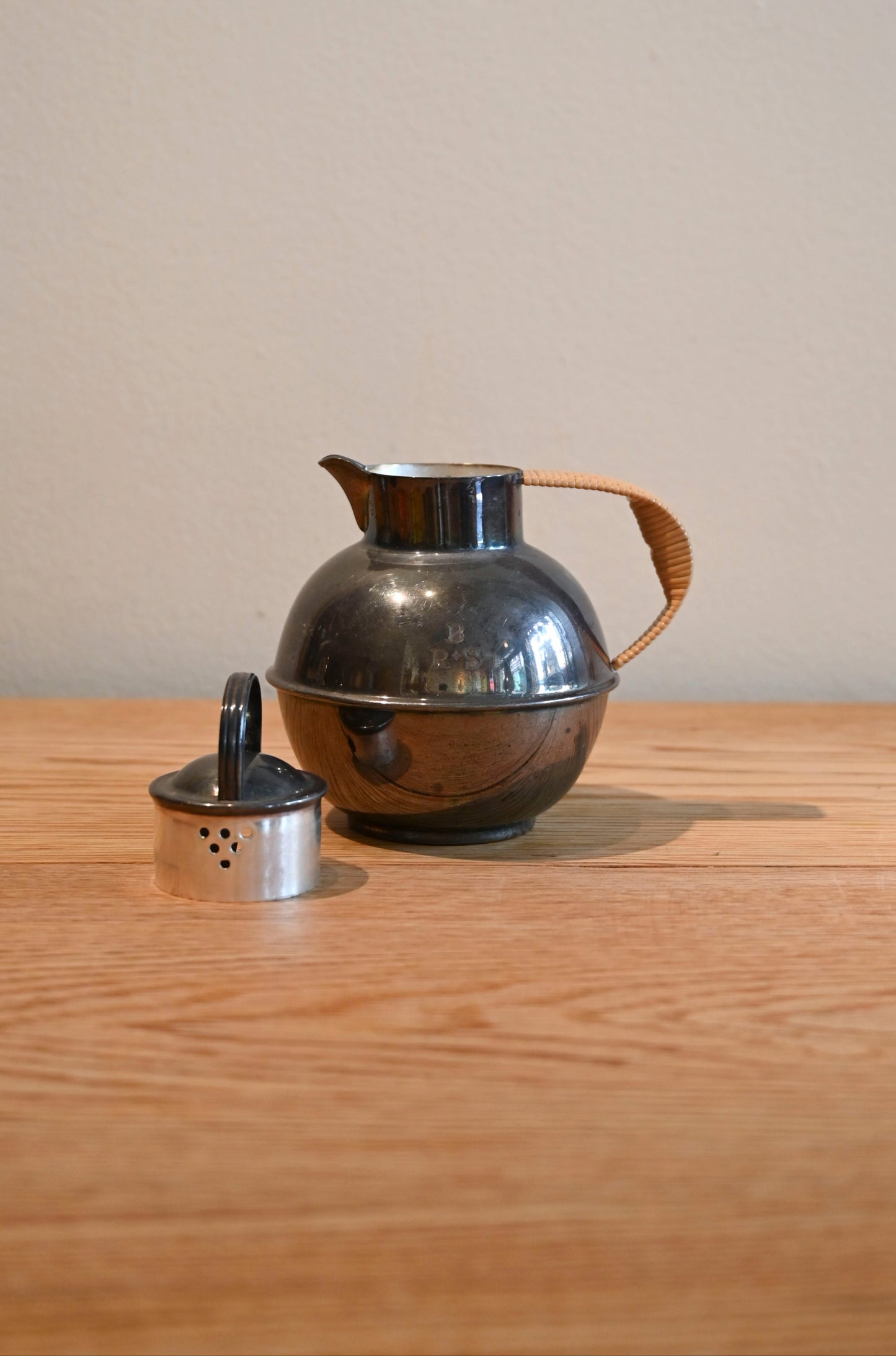 Vintage silver plated teapot with woven handle