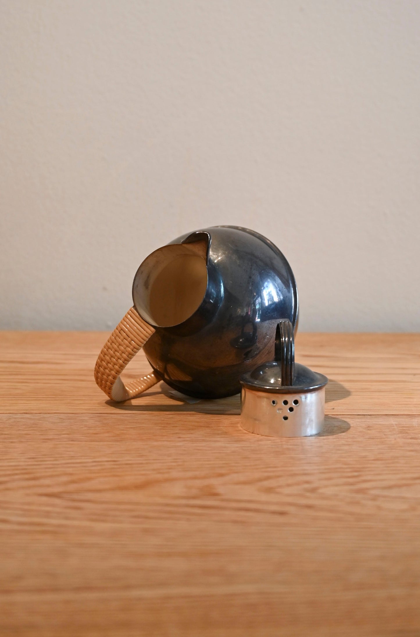 Vintage silver plated teapot with woven handle