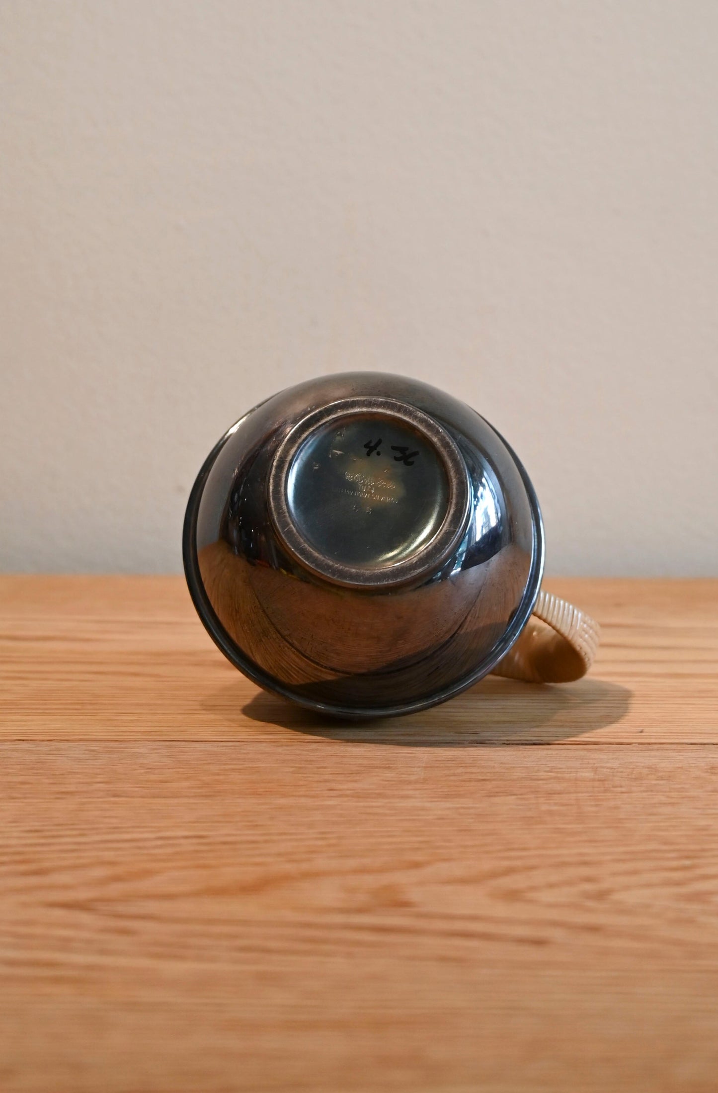 Vintage silver plated teapot with woven handle