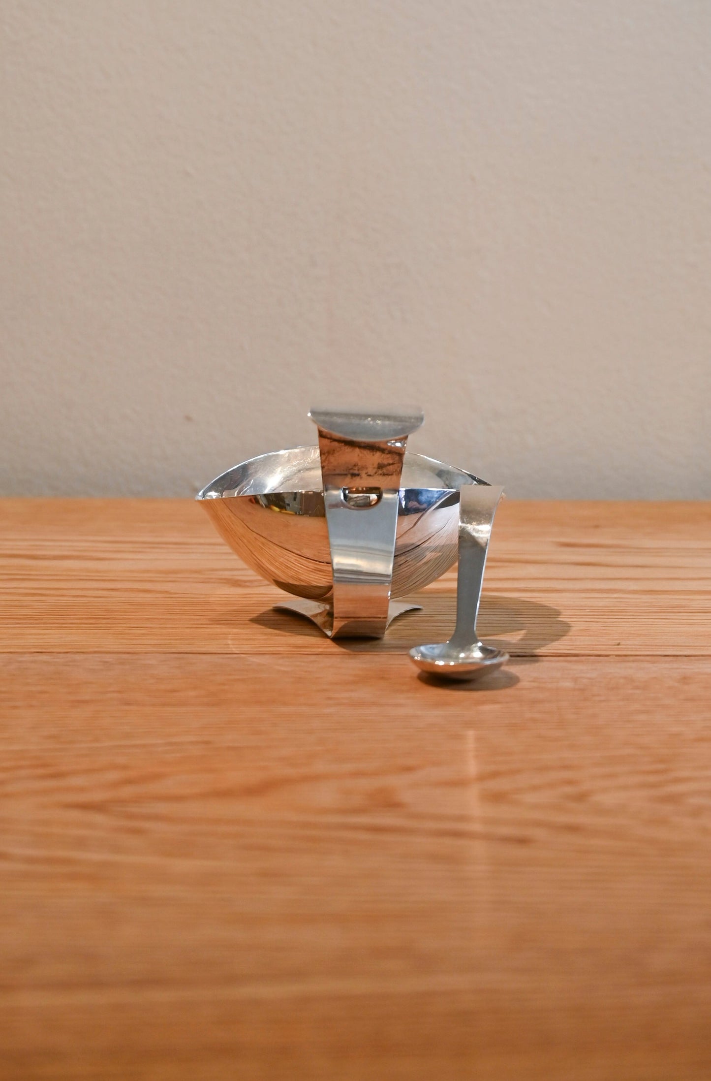 Vintage metal sauce dish with spoon