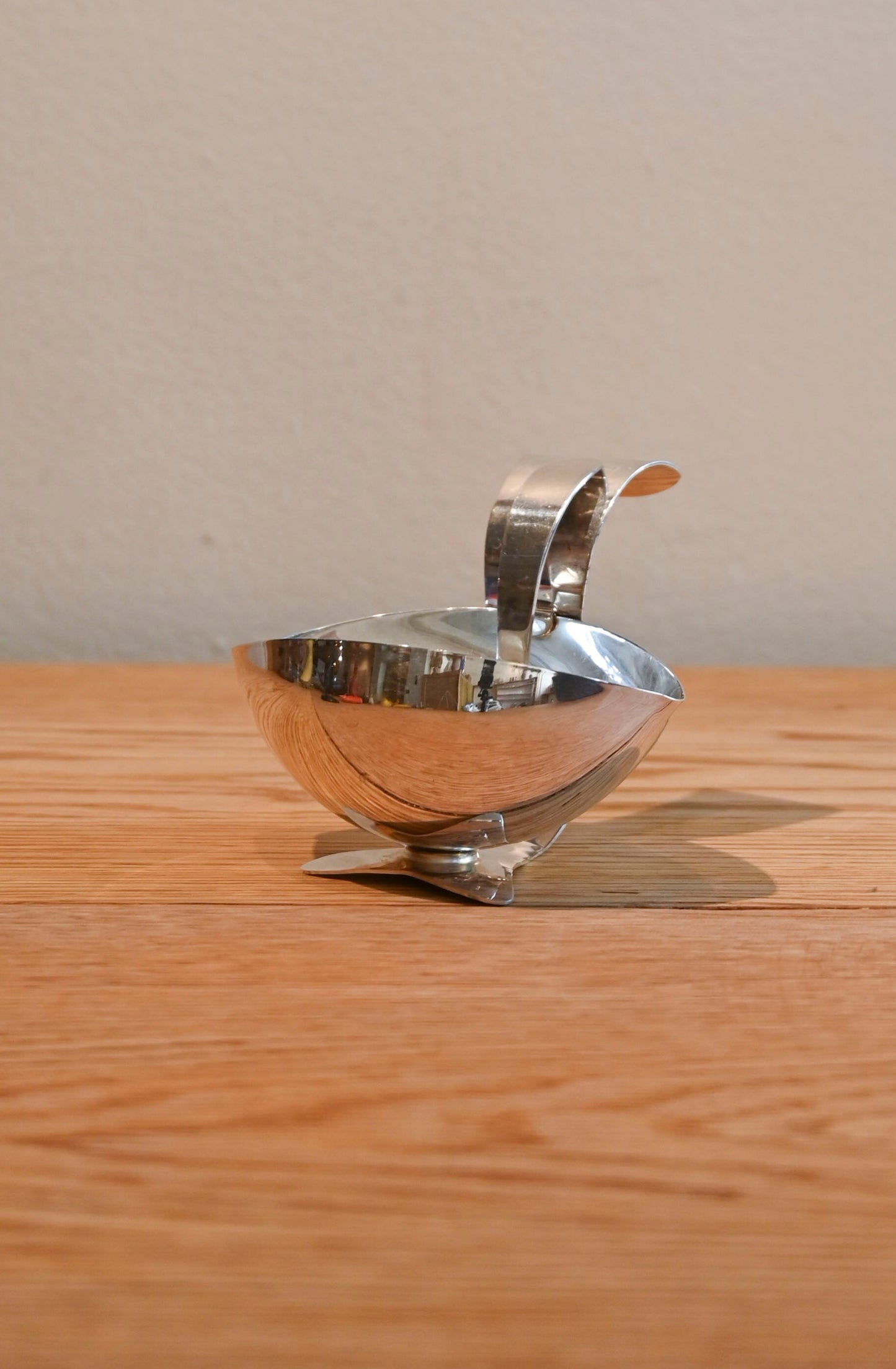 Vintage metal sauce dish with spoon
