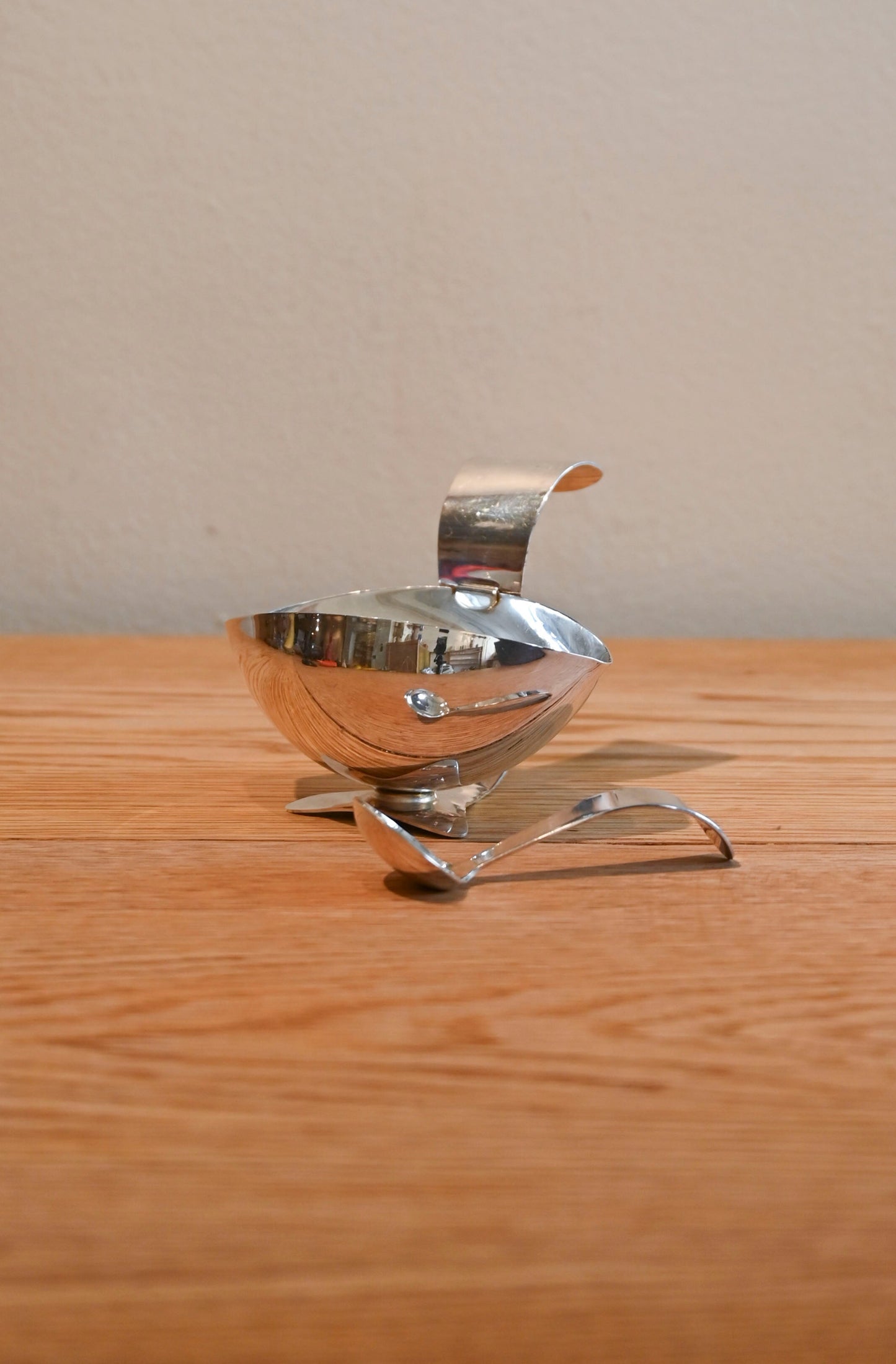 Vintage metal sauce dish with spoon