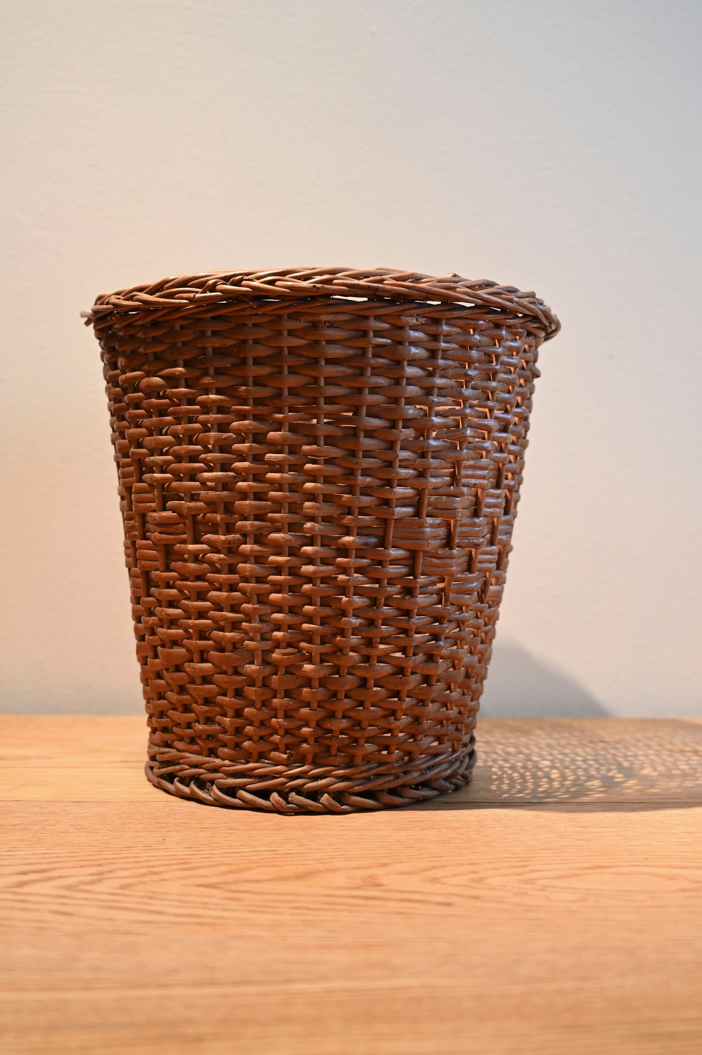 Large woven rubbish basket