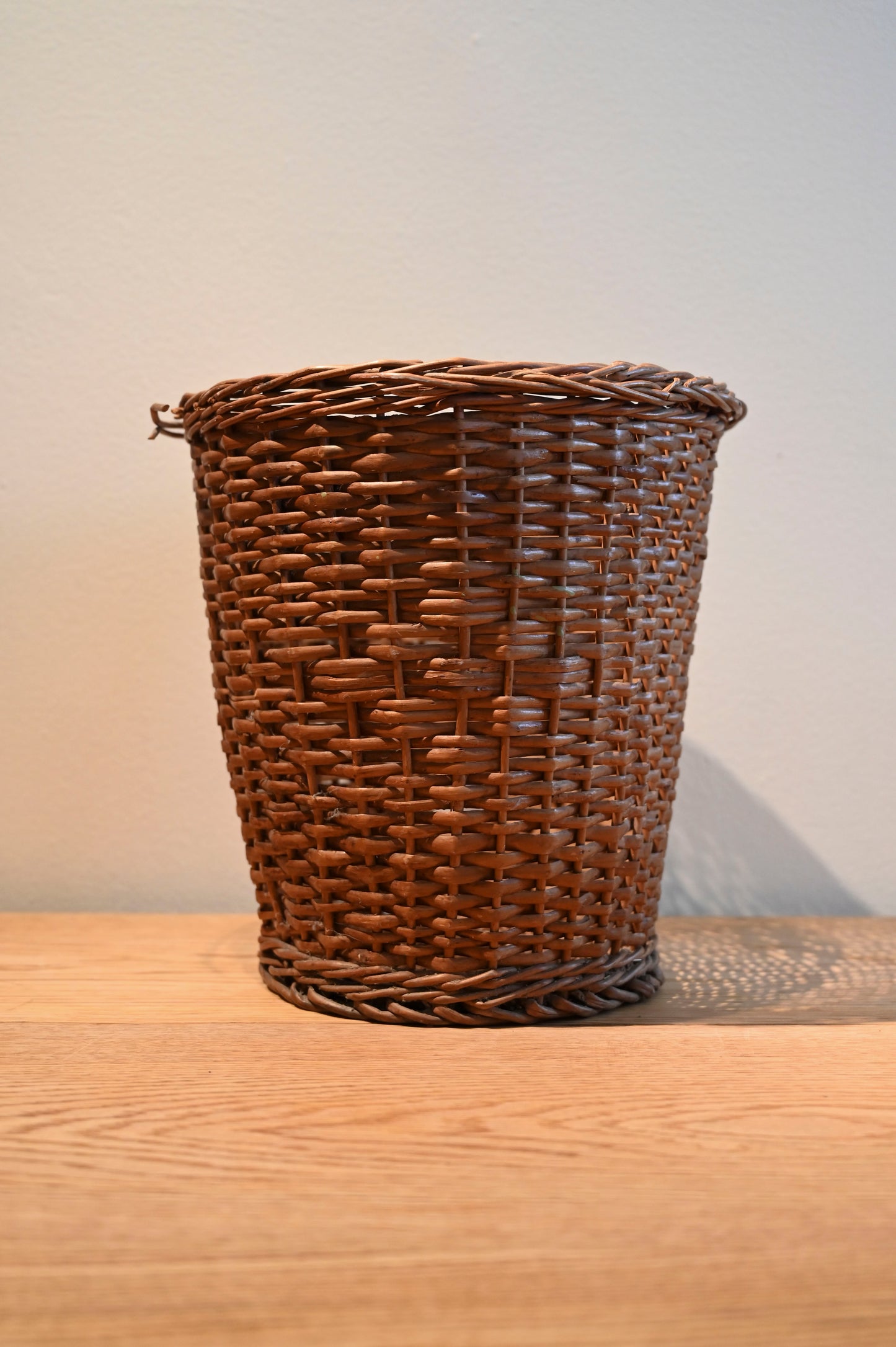 Large woven rubbish basket