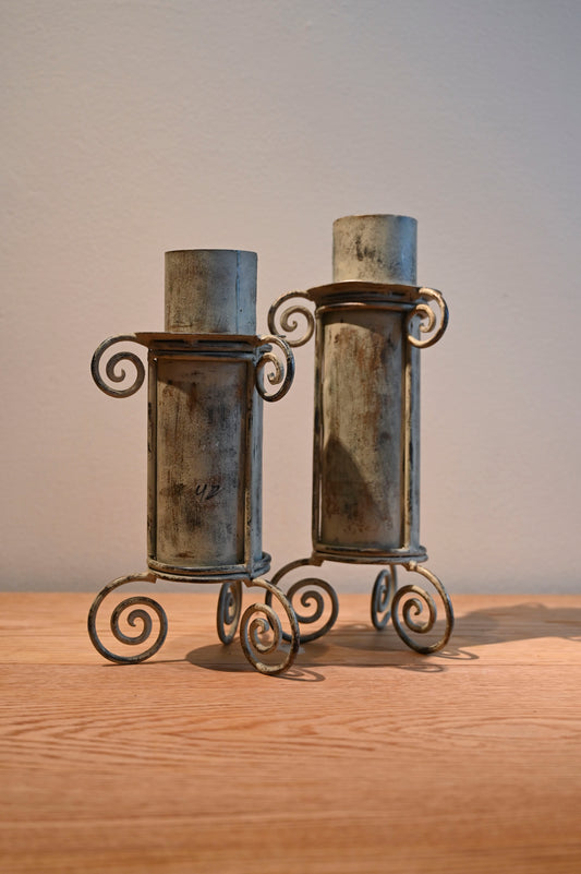 Metal pillar candle holders