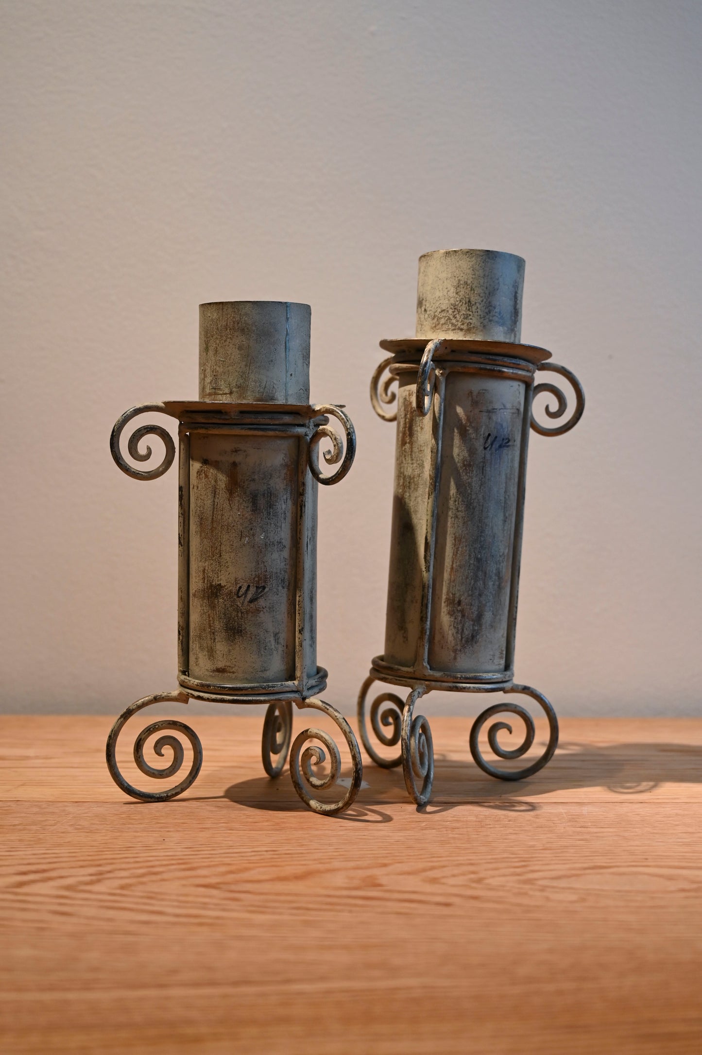 Metal pillar candle holders